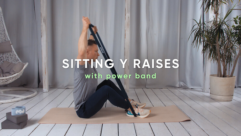 Zdjęcie ćwiczenia Sitting Y raises with power band