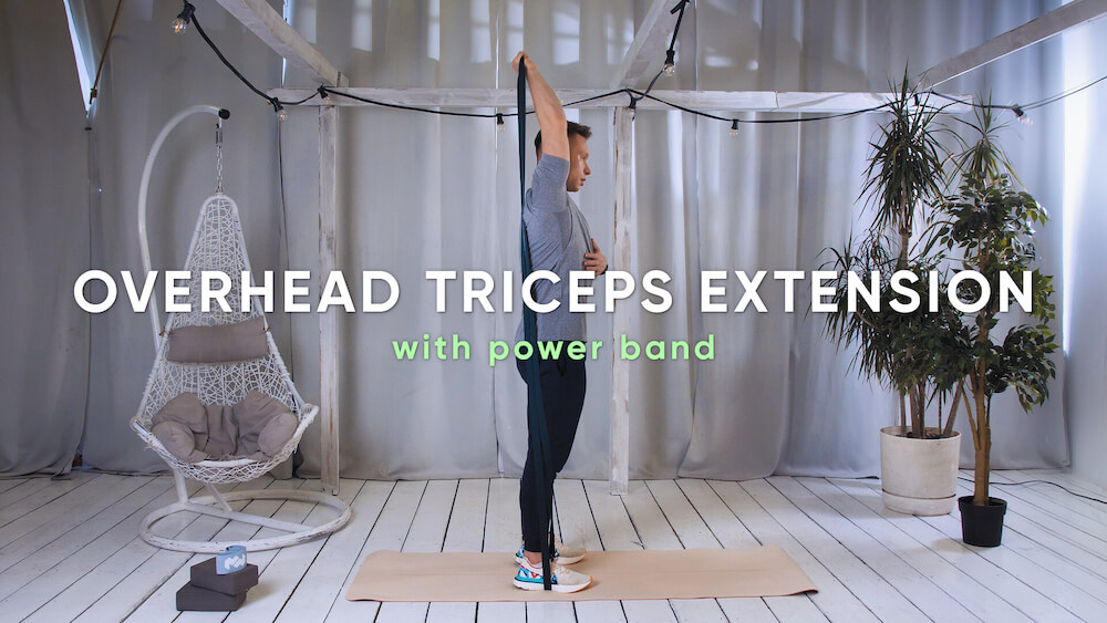 Zdjęcie ćwiczenia Overhead triceps extension with power band